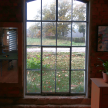 Fensteröffnung zum Feldweg